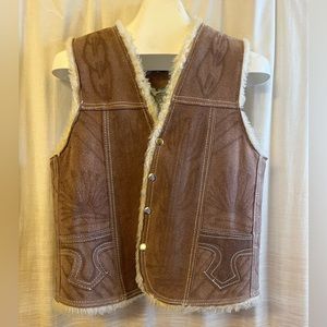 Vintage leather and Sherpa lined hand detailed vest